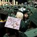 An Eastern Michigan University graduate looks for family members during the Spring Commencement on Sunday, April 28. Daniel Brenner I AnnArbor.com